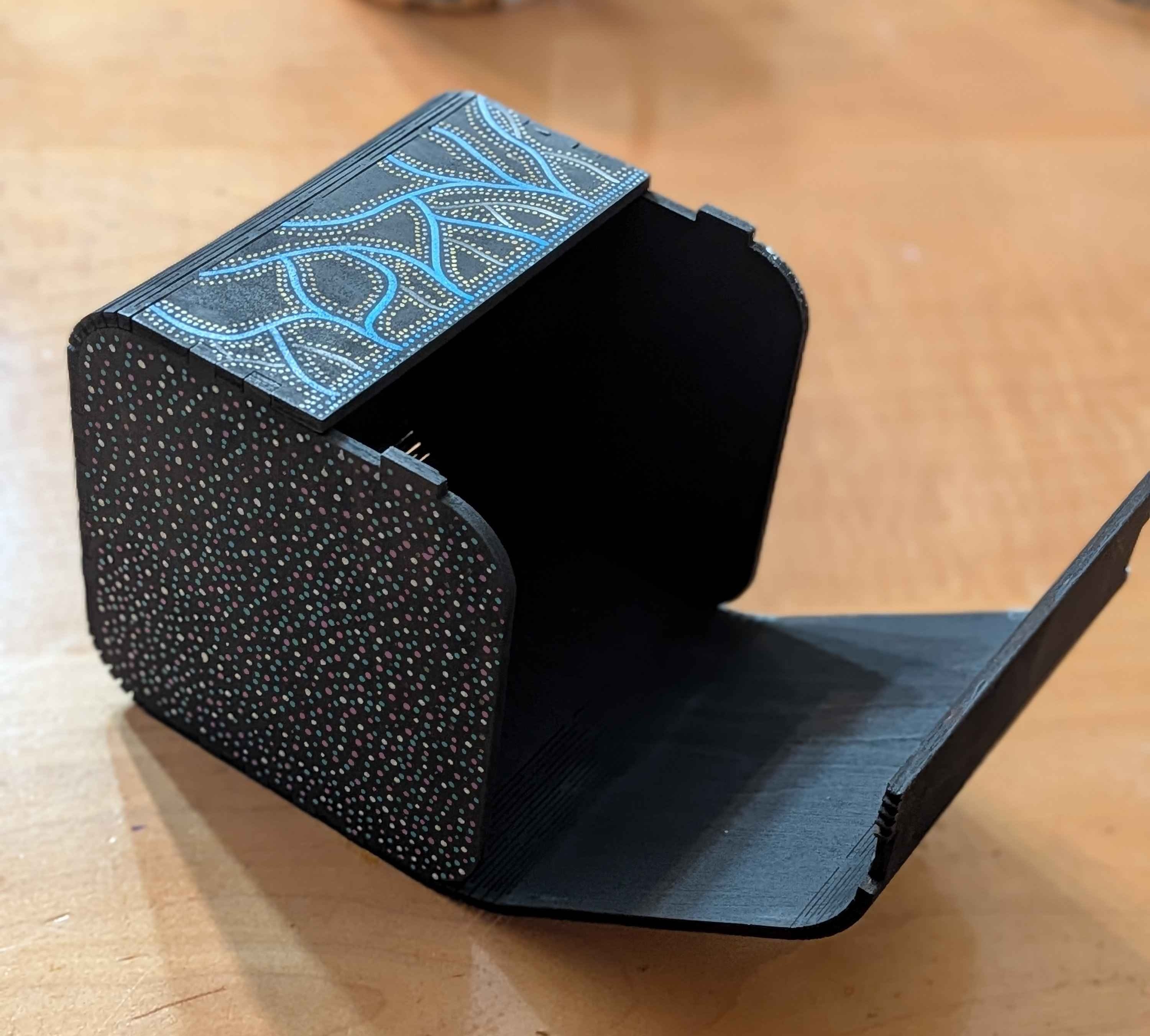 A cool painted, lasercut box with a living hinge